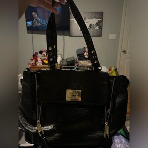 Good condition black juicy couture purse. Free very used wallet